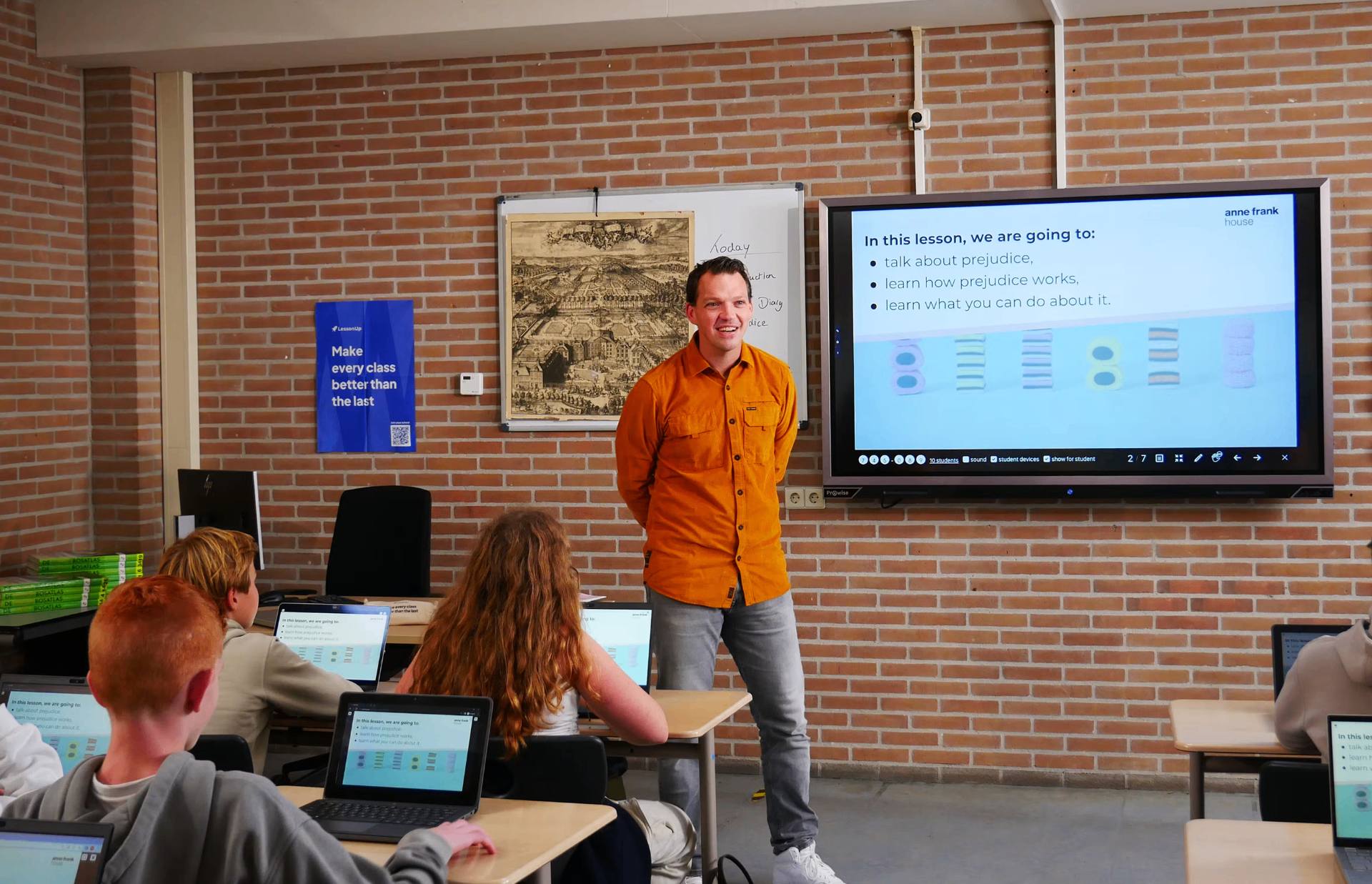 Teacher presenting a LessonUp interactive lesson to students in a classroom